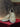SUEDE TASSLE SLIP-ONS