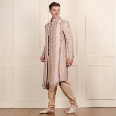 Grace in Gold: Peach Sherwani Set with Intricate Zari Embroidery