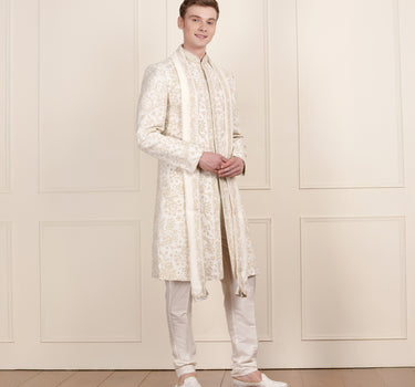 Men cream gold colour sherwani and pant