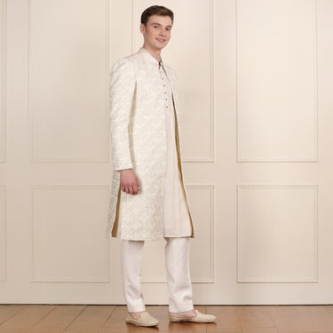 Regal Cream Sherwani with Golden Zari Work – Royal Ensemble