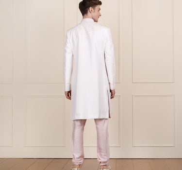 Men cream pink colour sherwani and pant